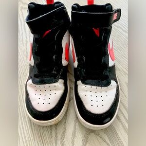 Girls size 2 black and pink Nikes. Lots of life left!!